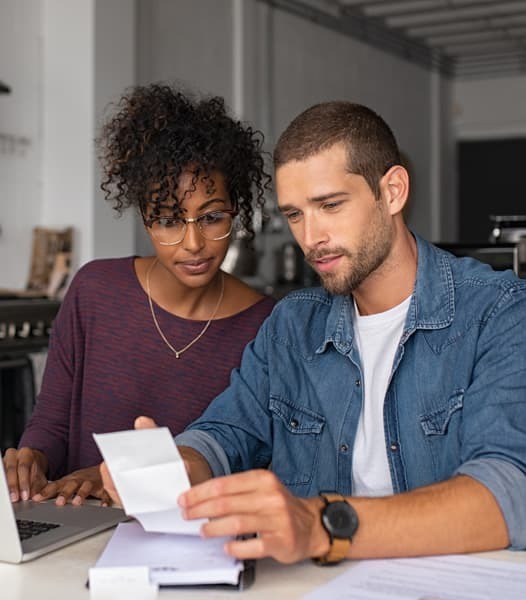 Couple checking bills